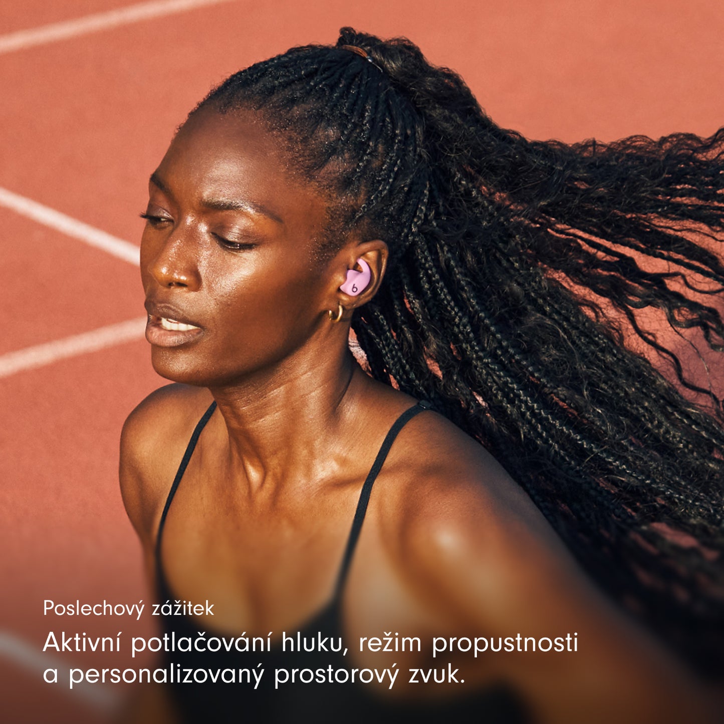 Bezdrátová sportovní sluchátka Powerbeats Fit - energicky růžová