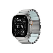 Řemínek pro Apple Watch 45/46/49 mm Nomad Stratos Natural Titanium FKM - Icy Blue Glow