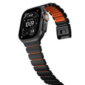 Řemínek pro Apple Watch 45/46/49mm Nomad Stratos Band Black Titanium Ultra FKM - černý/oranžový